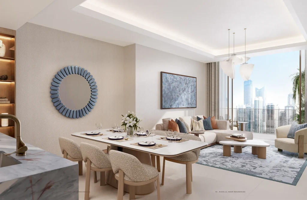 Modern living and dining area with skyline view at Rixos Al Reem Residences Abu Dhabi